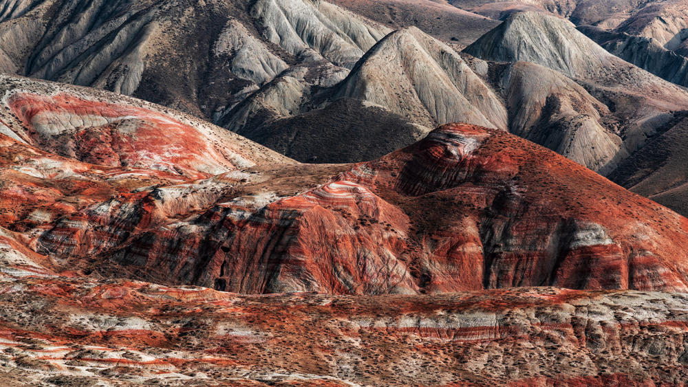 Striped red mountains landscape in Khizi